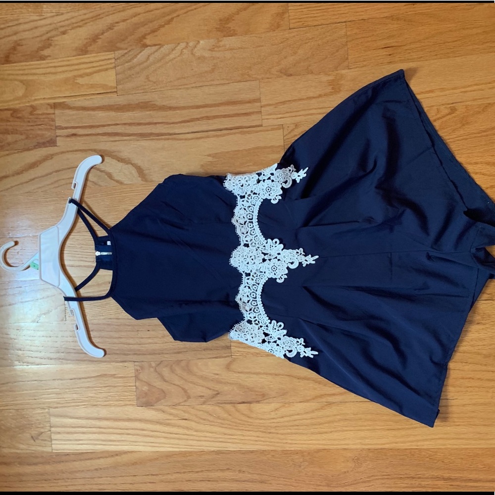 blue romper with white lace